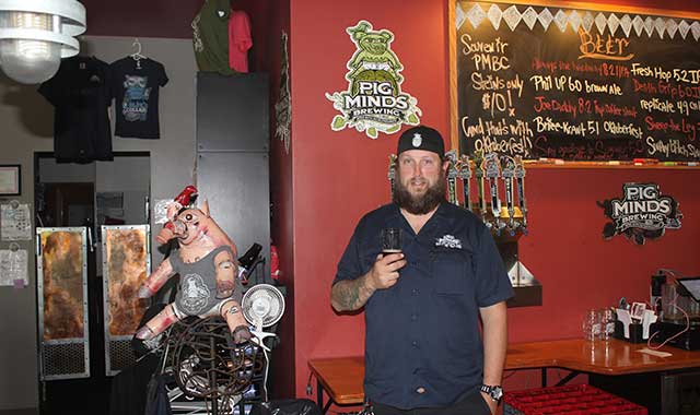 Pig Minds Brewmaster and General Manager Carson Souza encourages customers to give the brewery’s vegan menu a chance. 