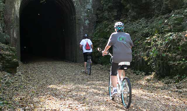 The primitive campsites at New Glarus Woods State Park attract those who truly enjoy “roughing it.” The park’s recreation trails lead toward nearby bike paths, including the Sugar River Trail, which has several tunnels. (Green County Tourism photo)