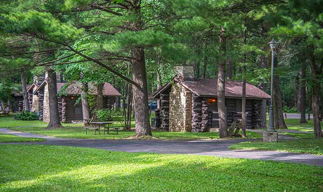 Choose from among several cabins and campground sites at White Pines State Park.