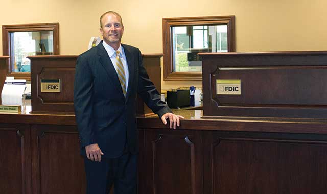 Keith Hogan, executive vice president of Crystal Lake Bank & Trust, says he enjoys the close interaction he has with the local community. (Brian Hughes photo)