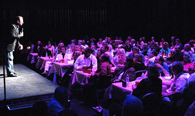 During most comedy shows, patrons sit cafe-style on the Raue stage.
